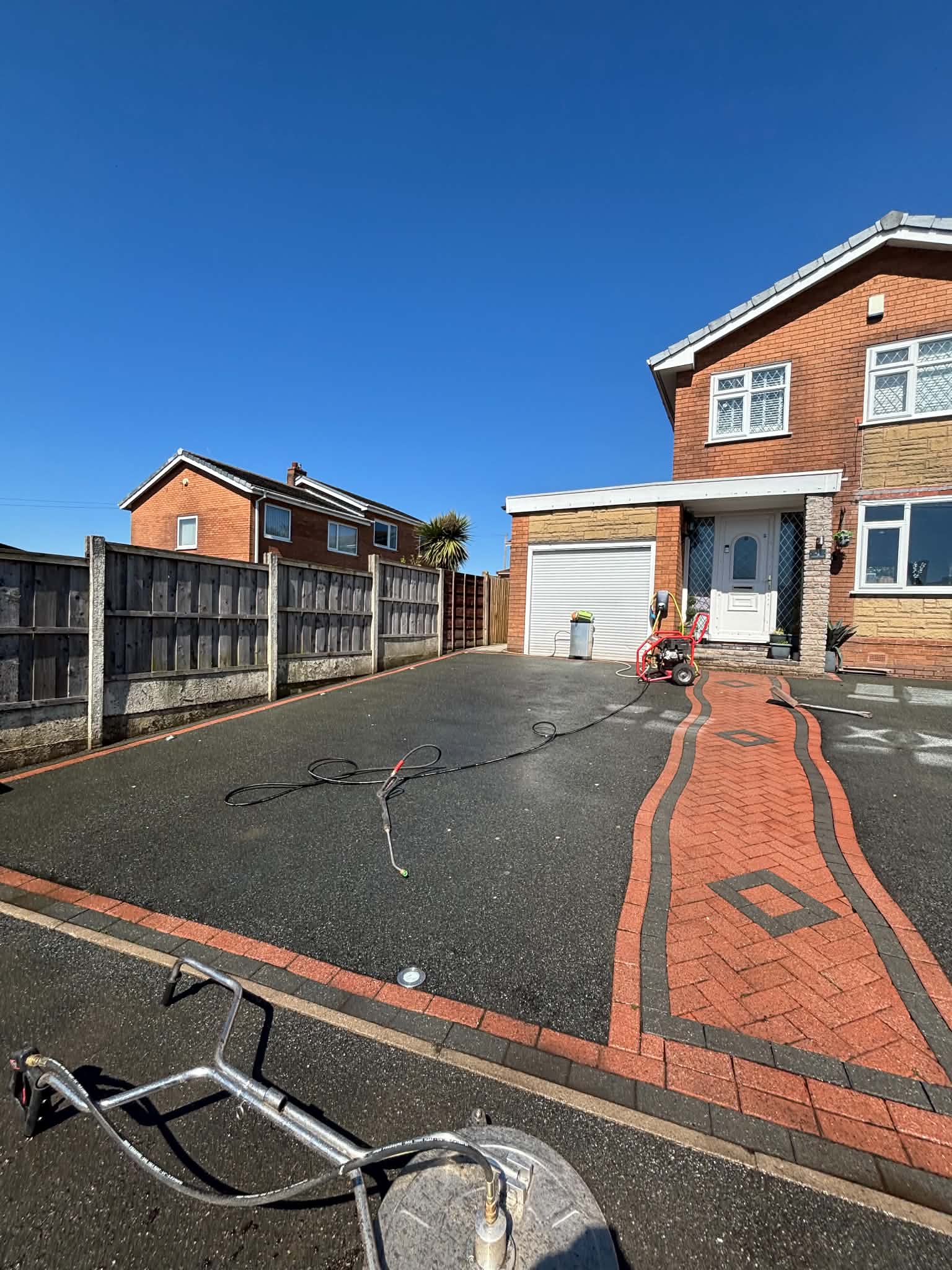 Driveway after pressure washing